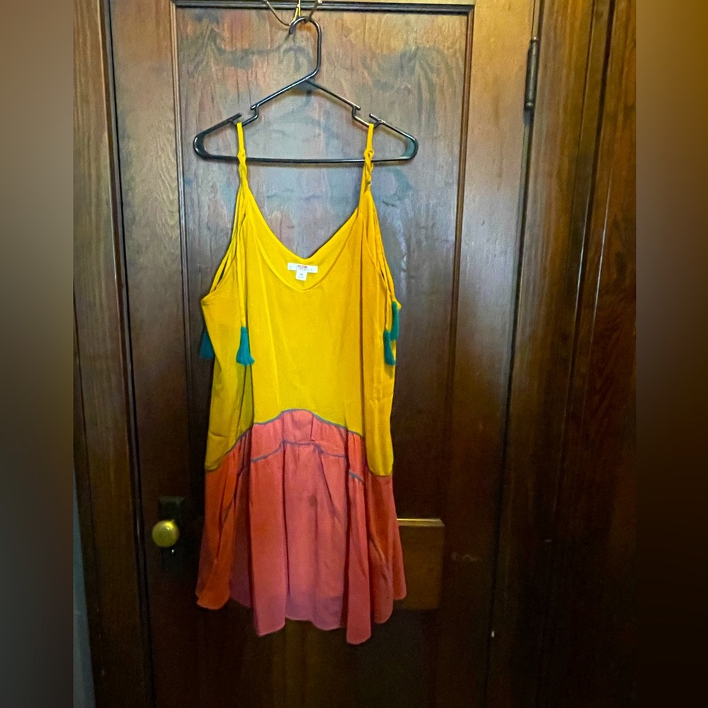 Mustard and teal sleeveless boho shirt.  Great for a coverup of fun dress.